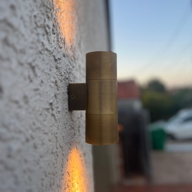 Stelvio Outdoor Sconce Antique Brass Up Down Light Sconce Light TriadCommerceInc
