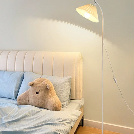 Minimalist floor lamp with a pleated lampshade Floor Lamps TriadCommerceInc